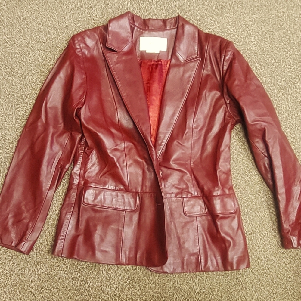 100% real leather jacket in a stunning deep red with satin lining size 8